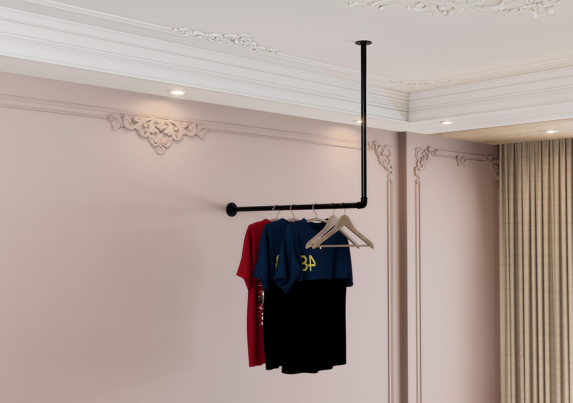 a clothes rack with a t - shirt hanging from it