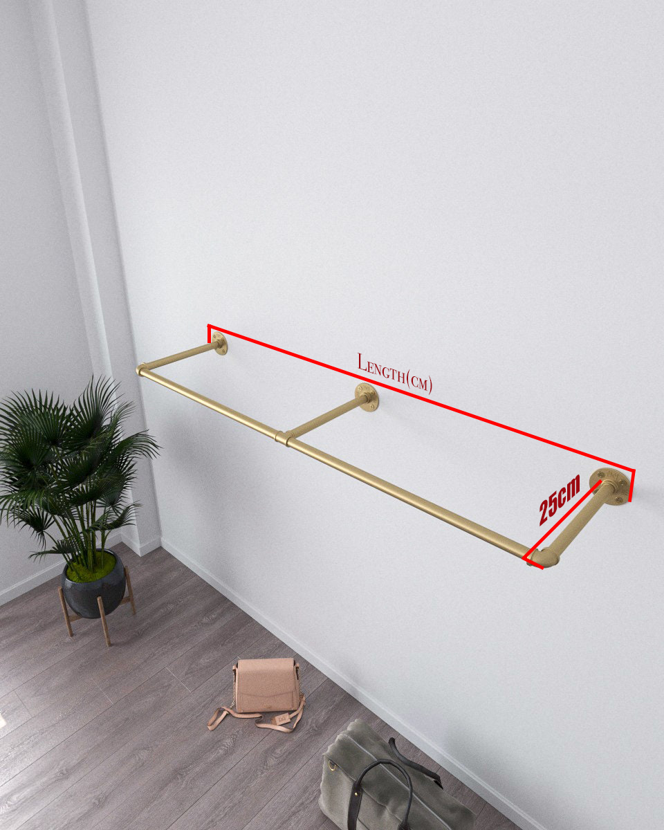 Arvuy Golden Wall Mounted Clothes Rack, an elegant and adjustable clothes rack with a golden finish, suitable for home organization or retail display