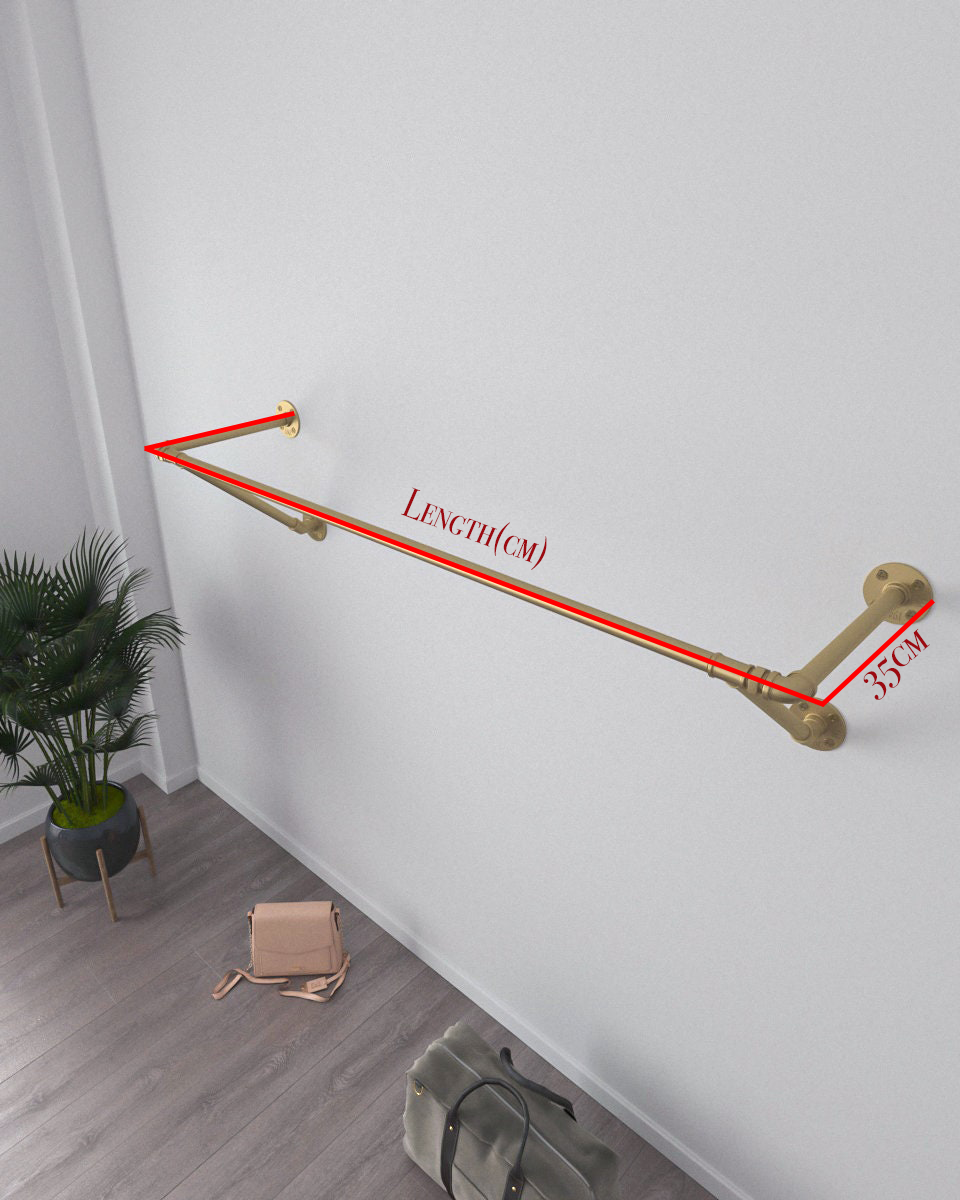Golden Wall Mounted Clothes Rack, an elegant clothes rail and open wardrobe solution, suitable for commercial and home clothes storage.