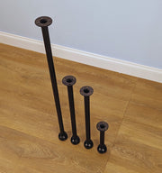 customizable furniture legs made from 3/4" malleable pipe in steampunk style. Available in various colours and adjustable heights from 10cm to 120cm. Ideal for enhancing furniture or DIY projects.